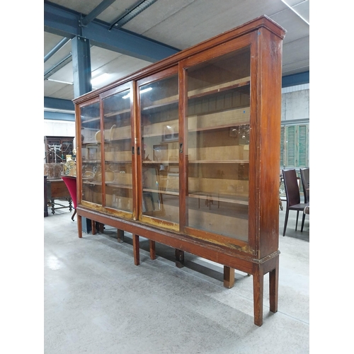 330 - Edwardian pine chemist shop glazed display cabinet on stand with square legs and sliding doors. {206... 