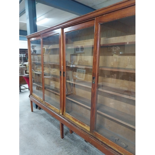 330 - Edwardian pine chemist shop glazed display cabinet on stand with square legs and sliding doors. {206... 