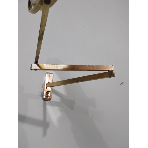 35 - Brass angle poise wall mounted mirror. {26 cm H x 30 cm W x 30 cm D}.