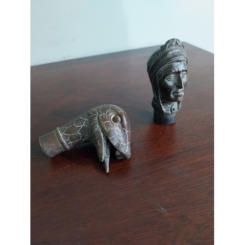 376 - Two bronze walking stick tops � Snake and Ladies Head. {8 cm H}.