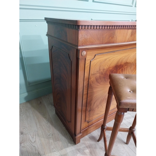 391 - Mahogany home bar counter with shaped reeded front with two mahogany and leather upholstered stools ... 