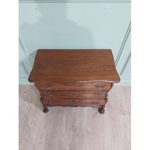 395 - Oak Bombay chest of drawers in the Victorian style. {64 cm H x 77 cm W x 40 cm D}.