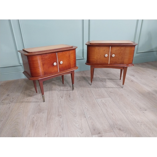 396 - Pair of Italian mid century walnut and maple two door bedside lockers raised on tapered legs and bra... 