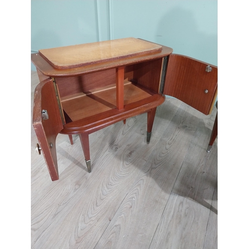 396 - Pair of Italian mid century walnut and maple two door bedside lockers raised on tapered legs and bra... 