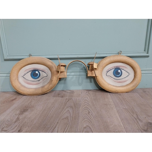 4 - Painted metal optician's sign. {30 cm H x 90 cm W x 15 cm D}.