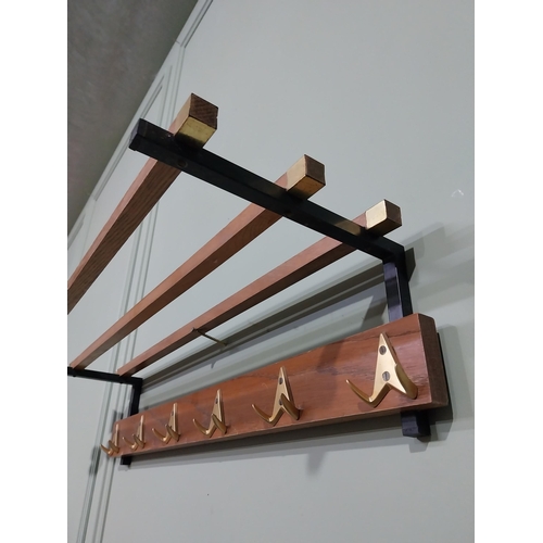 400 - Mid century teak and brass luggage rack. {19 cm H x 75 cm W x 25 cm D}.