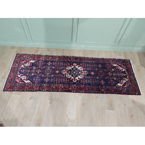 405 - Decorative Persian carpet runner. {290 cm H x 110 cm W}.