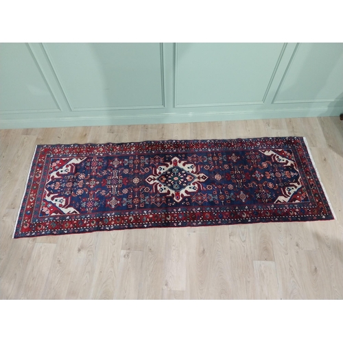 405 - Decorative Persian carpet runner. {290 cm H x 110 cm W}.