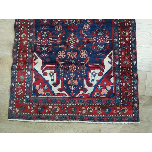 405 - Decorative Persian carpet runner. {290 cm H x 110 cm W}.