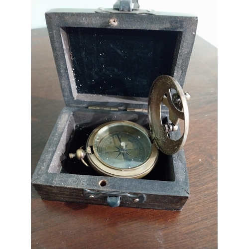 406 - Small brass telescope R and J Beck Ltd London and cased compass.