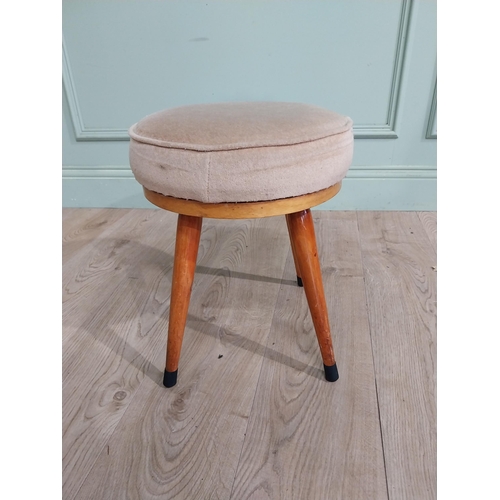 409 - Retro pine and upholstered stool raised on four splayed legs. {40 cm H x 32 cm Dia.}.