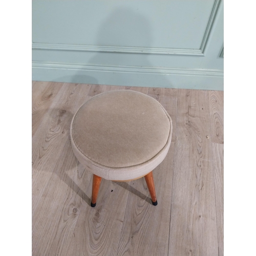 409 - Retro pine and upholstered stool raised on four splayed legs. {40 cm H x 32 cm Dia.}.