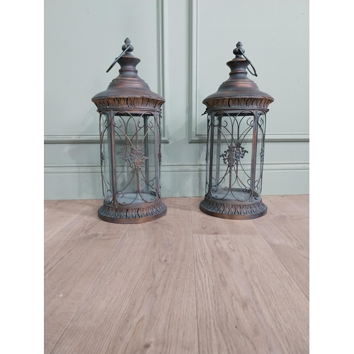 41 - Pair of decorative metal lanterns. {64 cm H x 24 cm Dia.}.