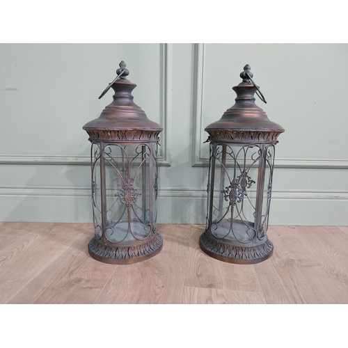 41 - Pair of decorative metal lanterns. {64 cm H x 24 cm Dia.}.