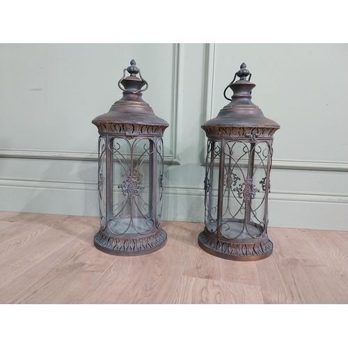 41 - Pair of decorative metal lanterns. {64 cm H x 24 cm Dia.}.