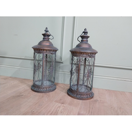 41 - Pair of decorative metal lanterns. {64 cm H x 24 cm Dia.}.