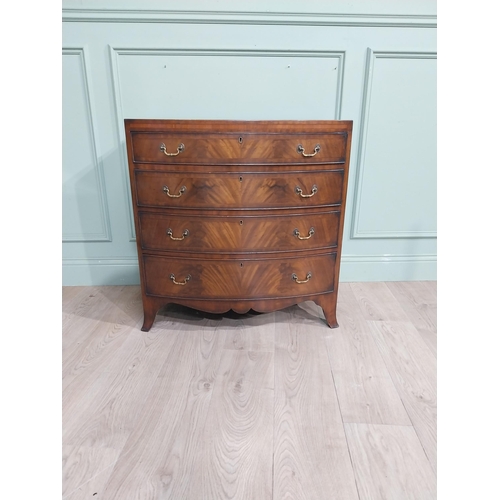 413 - 19th C. Mahogany and satinwood chest of drawers with four graduated long drawers raised on bracket f... 