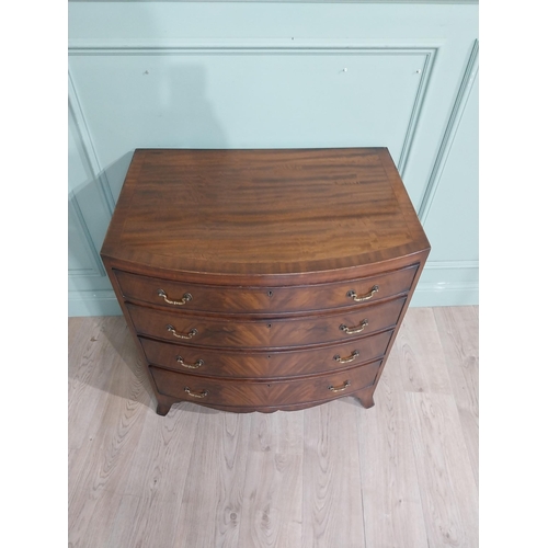 413 - 19th C. Mahogany and satinwood chest of drawers with four graduated long drawers raised on bracket f... 