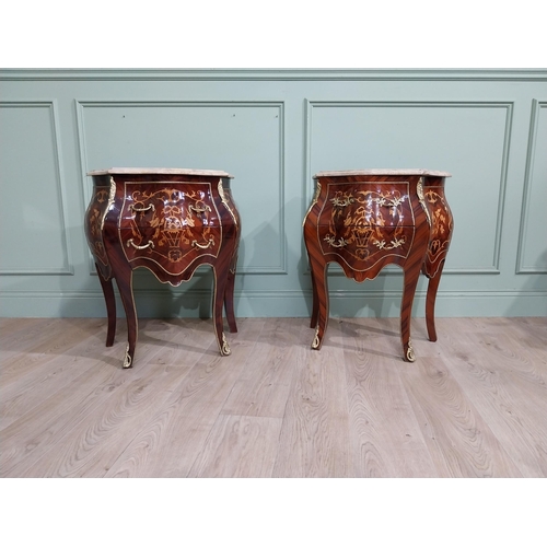 45 - Pair of inlaid kingwood bow fronted bedside cabinets with marble tops and decorated with ormolu moun... 