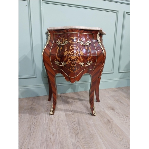 45 - Pair of inlaid kingwood bow fronted bedside cabinets with marble tops and decorated with ormolu moun... 