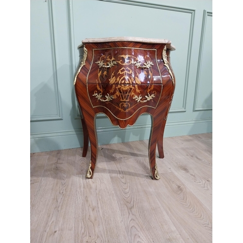 45 - Pair of inlaid kingwood bow fronted bedside cabinets with marble tops and decorated with ormolu moun... 