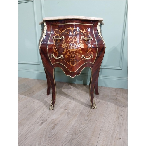 45 - Pair of inlaid kingwood bow fronted bedside cabinets with marble tops and decorated with ormolu moun... 