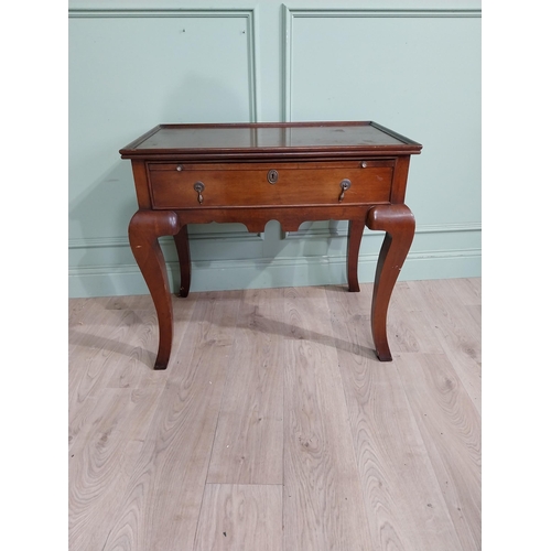 465 - Edwardian mahogany silver table with brushing slide and single drawer in frieze raised on shaped leg... 