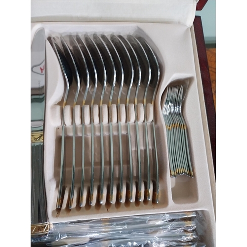 47 - Prima cutlery set in mahogany display case. {14 cm H x 46 cm W x 34 cm D}.