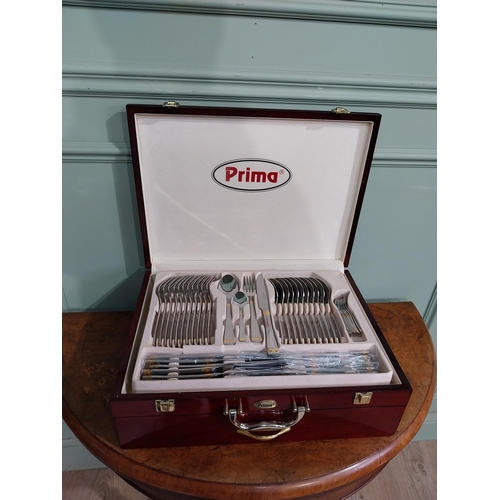 47 - Prima cutlery set in mahogany display case. {14 cm H x 46 cm W x 34 cm D}.