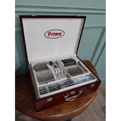 47 - Prima cutlery set in mahogany display case. {14 cm H x 46 cm W x 34 cm D}.