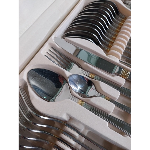 47 - Prima cutlery set in mahogany display case. {14 cm H x 46 cm W x 34 cm D}.