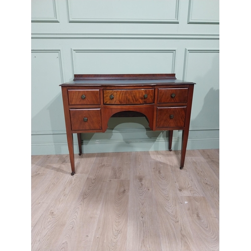 483 - 1950's walnut kneehole desk with tooled leather top raised on tapered legs. {85 cm H x 105 cm W x 48... 