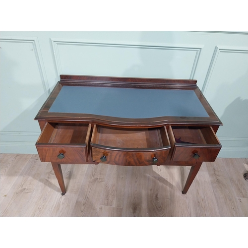 483 - 1950�s walnut kneehole desk with tooled leather top raised on tapered legs. {85 cm H x 105 cm W x 48... 