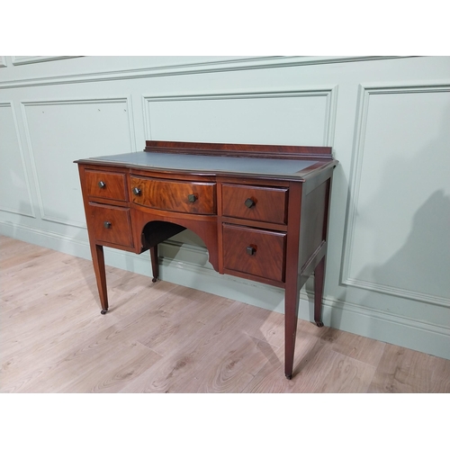 483 - 1950's walnut kneehole desk with tooled leather top raised on tapered legs. {85 cm H x 105 cm W x 48... 