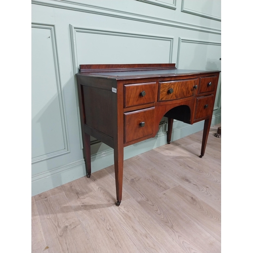 483 - 1950's walnut kneehole desk with tooled leather top raised on tapered legs. {85 cm H x 105 cm W x 48... 