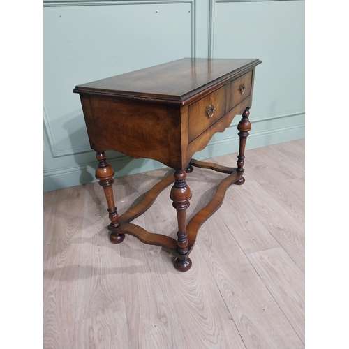 485 - Edwardian walnut side table in the Tudor style with two drawers in frieze raised on turned legs. {77... 