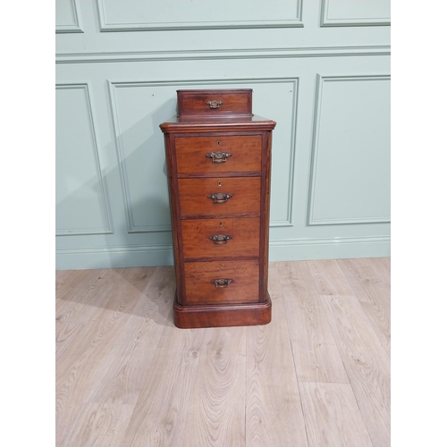 489 - 19th C. Mahogany bedside cabinet with five short drawers. {103 cm H x 44 cm W x 62 cm D}.