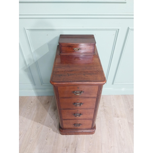 489 - 19th C. Mahogany bedside cabinet with five short drawers. {103 cm H x 44 cm W x 62 cm D}.