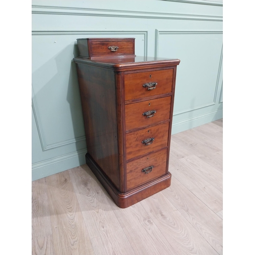 489 - 19th C. Mahogany bedside cabinet with five short drawers. {103 cm H x 44 cm W x 62 cm D}.