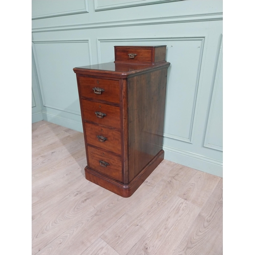 489 - 19th C. Mahogany bedside cabinet with five short drawers. {103 cm H x 44 cm W x 62 cm D}.