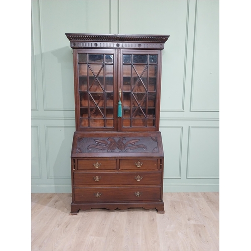 490 - Edwardian mahogany bureau bookcase raised on bracket feet with two long drawers over two short drawe... 