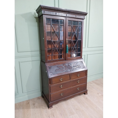 490 - Edwardian mahogany bureau bookcase raised on bracket feet with two long drawers over two short drawe... 