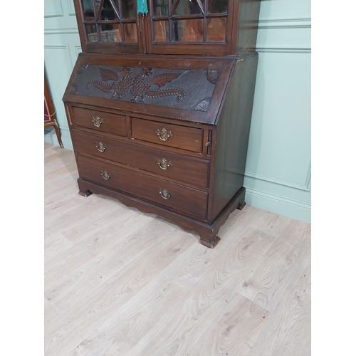 490 - Edwardian mahogany bureau bookcase raised on bracket feet with two long drawers over two short drawe... 