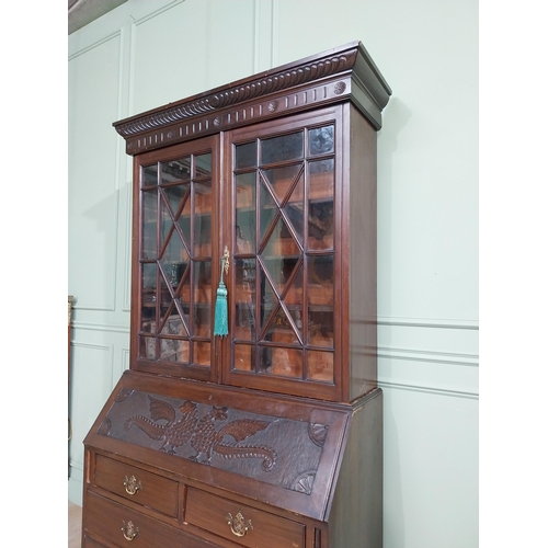 490 - Edwardian mahogany bureau bookcase raised on bracket feet with two long drawers over two short drawe... 