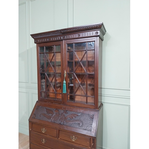 490 - Edwardian mahogany bureau bookcase raised on bracket feet with two long drawers over two short drawe... 