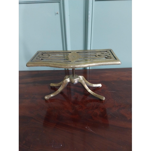 492 - Victorian style brass trivet on four splayed feet. { 16 cm H x 30 cm W x 14 cm D}.