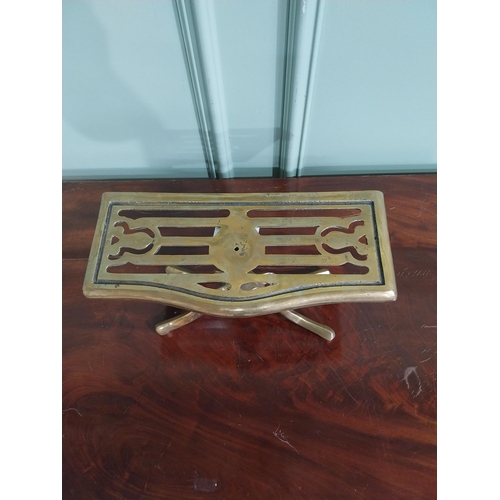 492 - Victorian style brass trivet on four splayed feet. { 16 cm H x 30 cm W x 14 cm D}.