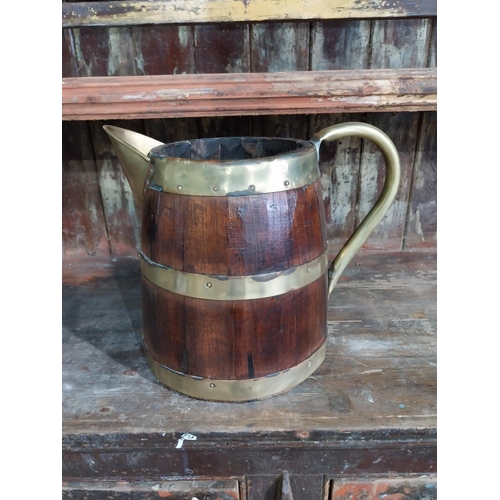 50 - 19th C. Brass bound oak water jug. {{28 cm H x 35 cm W x 20 cm D}.