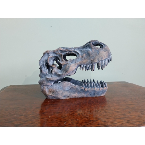 65 - Resin model of a Dinosaur skull. {15 cm H x 12 cm W x 20 cm D}.