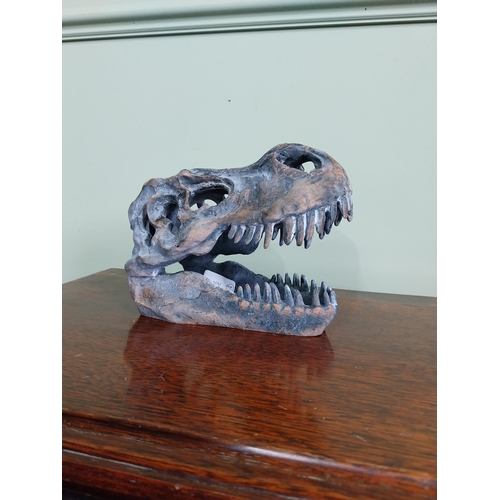 65 - Resin model of a Dinosaur skull. {15 cm H x 12 cm W x 20 cm D}.